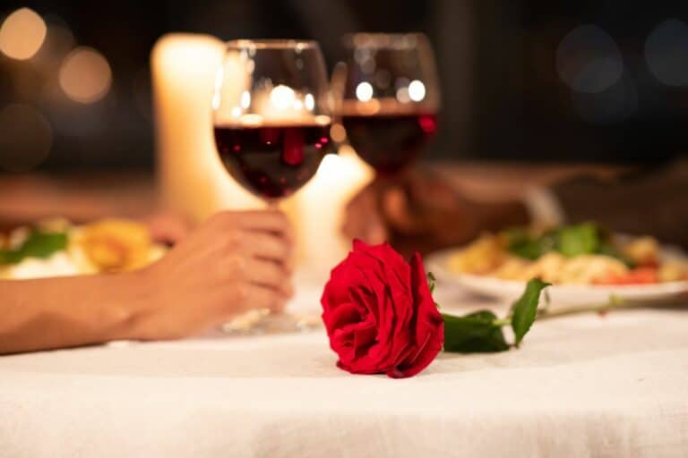 How To Spend Valentine's Day Near The Strand Hands Clinking Glasses On Served Restaurant Table. Shallow Depth